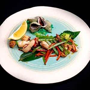 Моллюск Трубач в соусе ХО